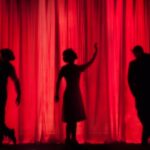 silhouette performers on stage play